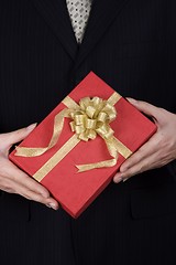 Image showing Holding Present