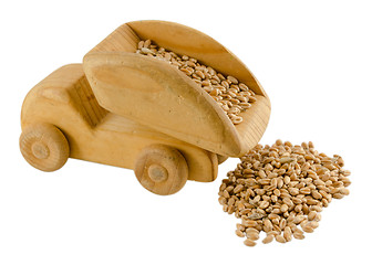 Image showing grain in truck wooden toy isolated on white 