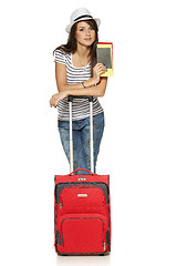 Image showing Female in casual standing with travel suitcase