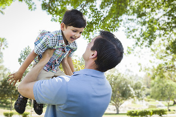 Image showing Father and Son Playing Together in the Park