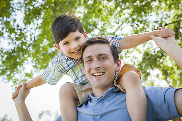 Image showing Father and Son Playing Piggyback in the Park