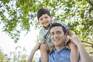 Image showing Father and Son Playing Piggyback in the Park