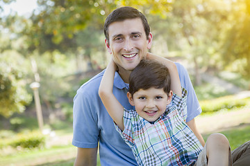 Image showing Handsome Mixed Race Father and Son Park Portrait