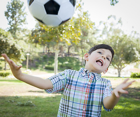 Image showing Cute Young Boy Playing with Soccer Ball in Park