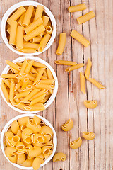 Image showing uncooked pasta in three bowls