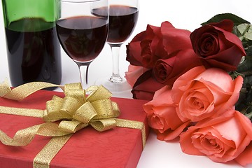 Image showing Roses With Present And Wine