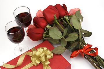 Image showing Roses With Present And Wine