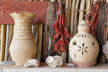 Image showing Clay pot and lantern