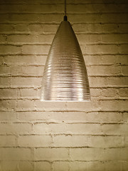 Image showing Metal lamp on brick background