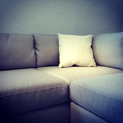 Image showing Corner sofa with white cushion