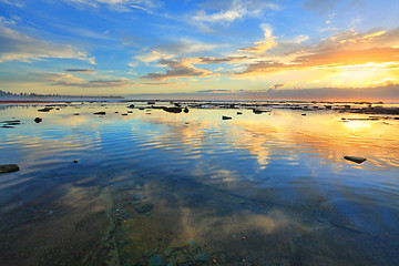 Image showing Heaven and Earth reflecting.  Morning sky reflected in the ocean