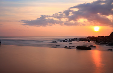 Image showing Looking over the pool to the ocean at Sunrise