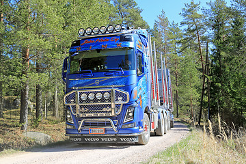 Image showing Volvo FH16 750 Timber Truck on Rural Road