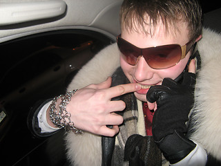 Image showing The glamour extravagant guy with phone in car2