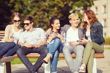 Image showing students looking at smartphones and tablet pc