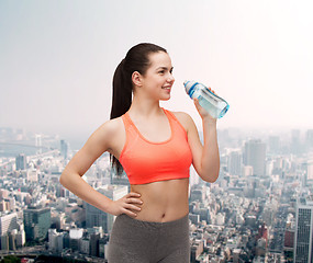 Image showing sporty woman with water bottle