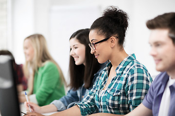 Image showing african student with computer studying at school