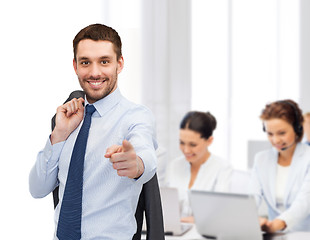 Image showing handsome buisnessman with jacket over shoulder