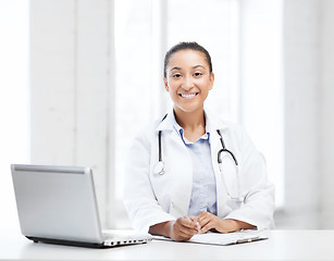 Image showing female doctor with laptop pc