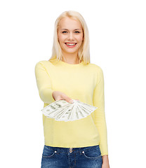 Image showing smiling girl with dollar cash money