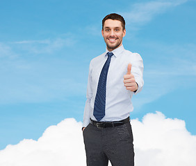 Image showing handsome businessman showing thumbs up