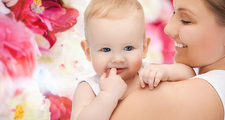 Image showing happy mother with adorable baby