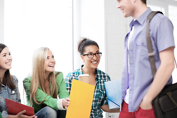 Image showing students communicating and laughing at school