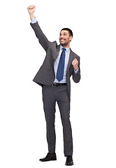 Image showing happy businessman with hands up