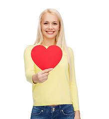 Image showing smiling woman with red heart