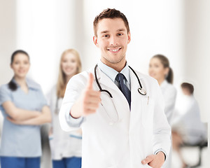 Image showing doctor with stethoscope showing thumbs up