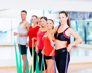 Image showing group of people working out with rubber bands