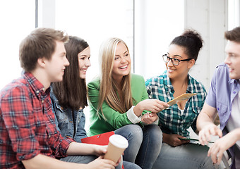 Image showing students communicating and laughing at school