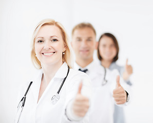 Image showing team of doctors showing thumbs up