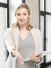 Image showing woman with an open hand ready for handshake