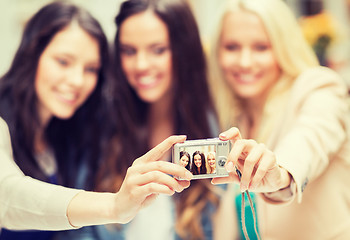 Image showing beautiful girls taking picture in the city