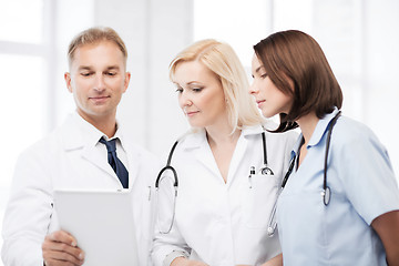 Image showing doctors looking at tablet pc