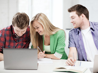 Image showing students writing something at school