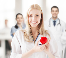 Image showing female doctor with heart