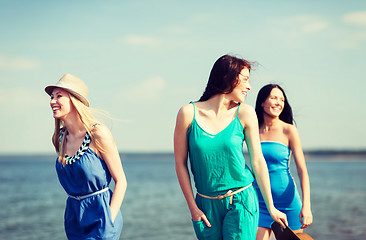 Image showing girls walking on the beach