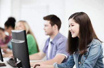 Image showing students with computers studying at school