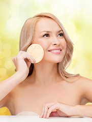 Image showing beautiful woman with sponge