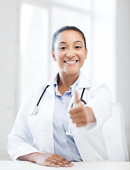 Image showing doctor with stethoscope showing thumbs up