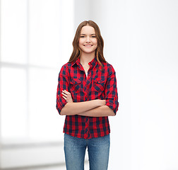 Image showing smiling young woman in casual clothes