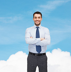 Image showing handsome businessman with crossed arms