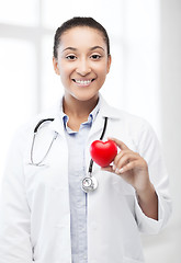 Image showing african doctor with heart