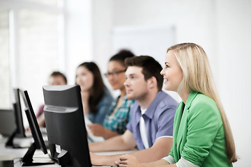 Image showing students with computers studying at school