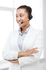 Image showing african helpline operator with headphones