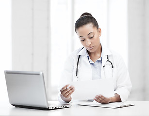 Image showing female doctor with laptop pc
