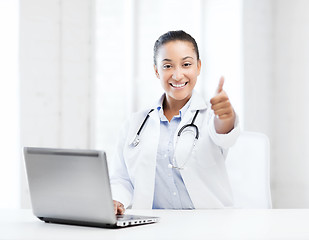 Image showing female doctor with laptop pc