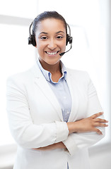 Image showing african helpline operator with headphones